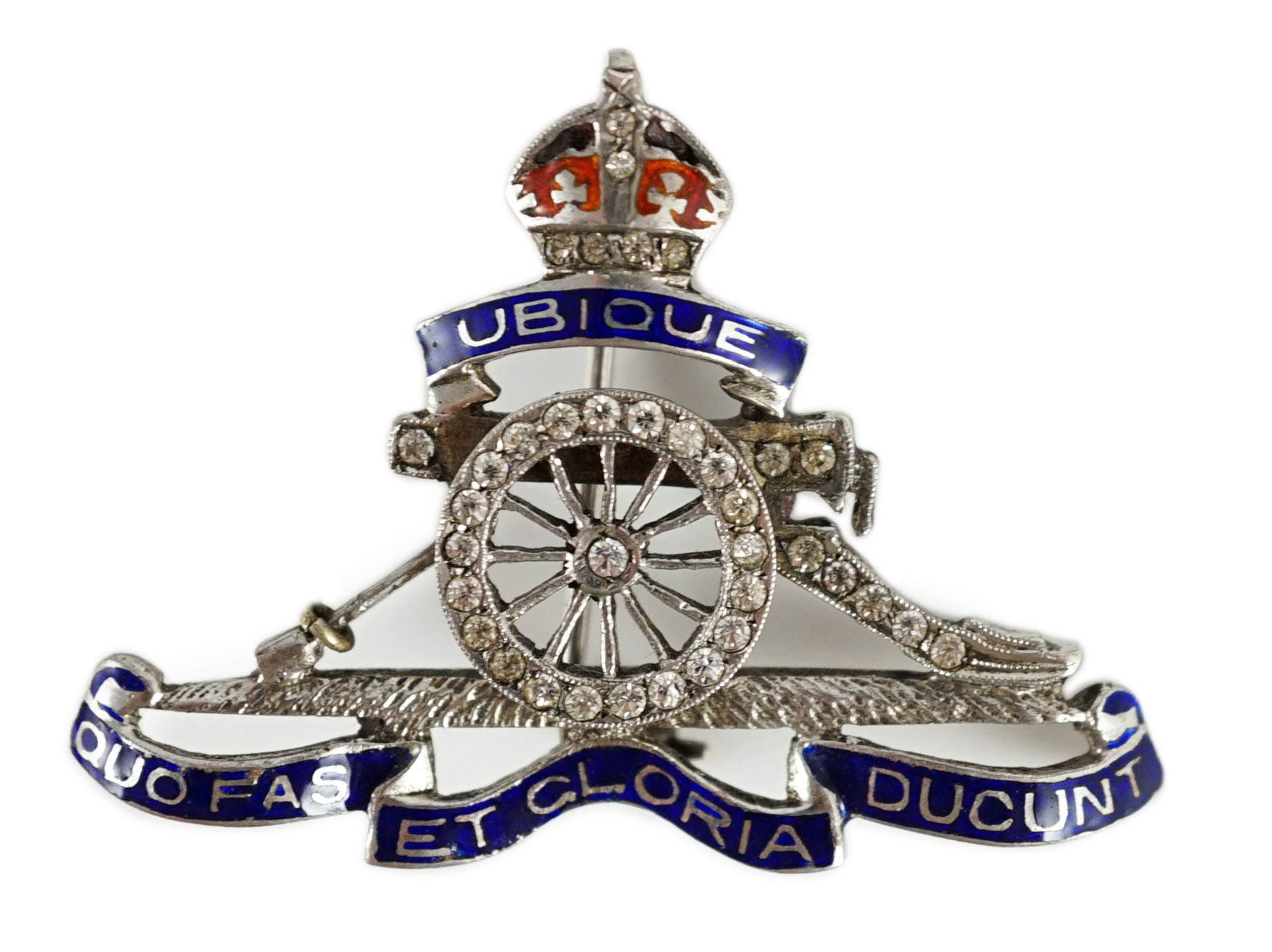 A white gold two colour enamel and diamond chip set Royal Artillery sweethearts brooch
